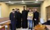 Професори и ученици Цетињске богословије на литургији у манастиру Житомислић